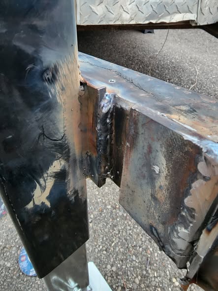 Steel plating welded inside a truck frame to reinforce a rusted section